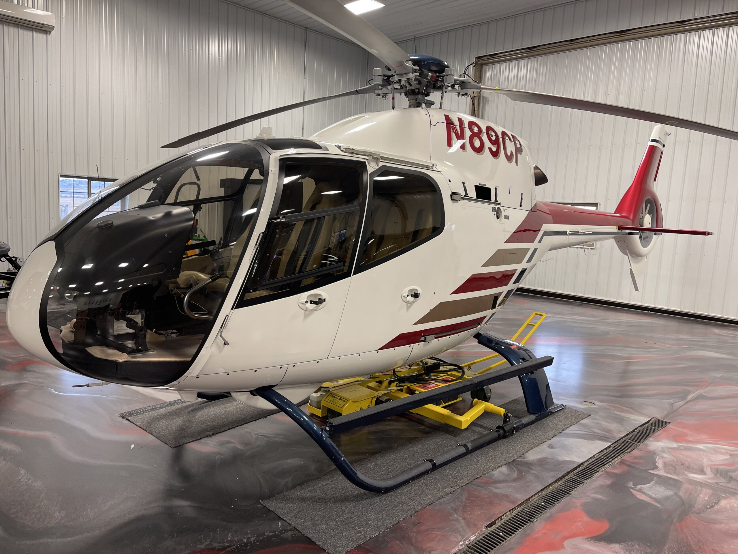 Tow cart below a helicopter