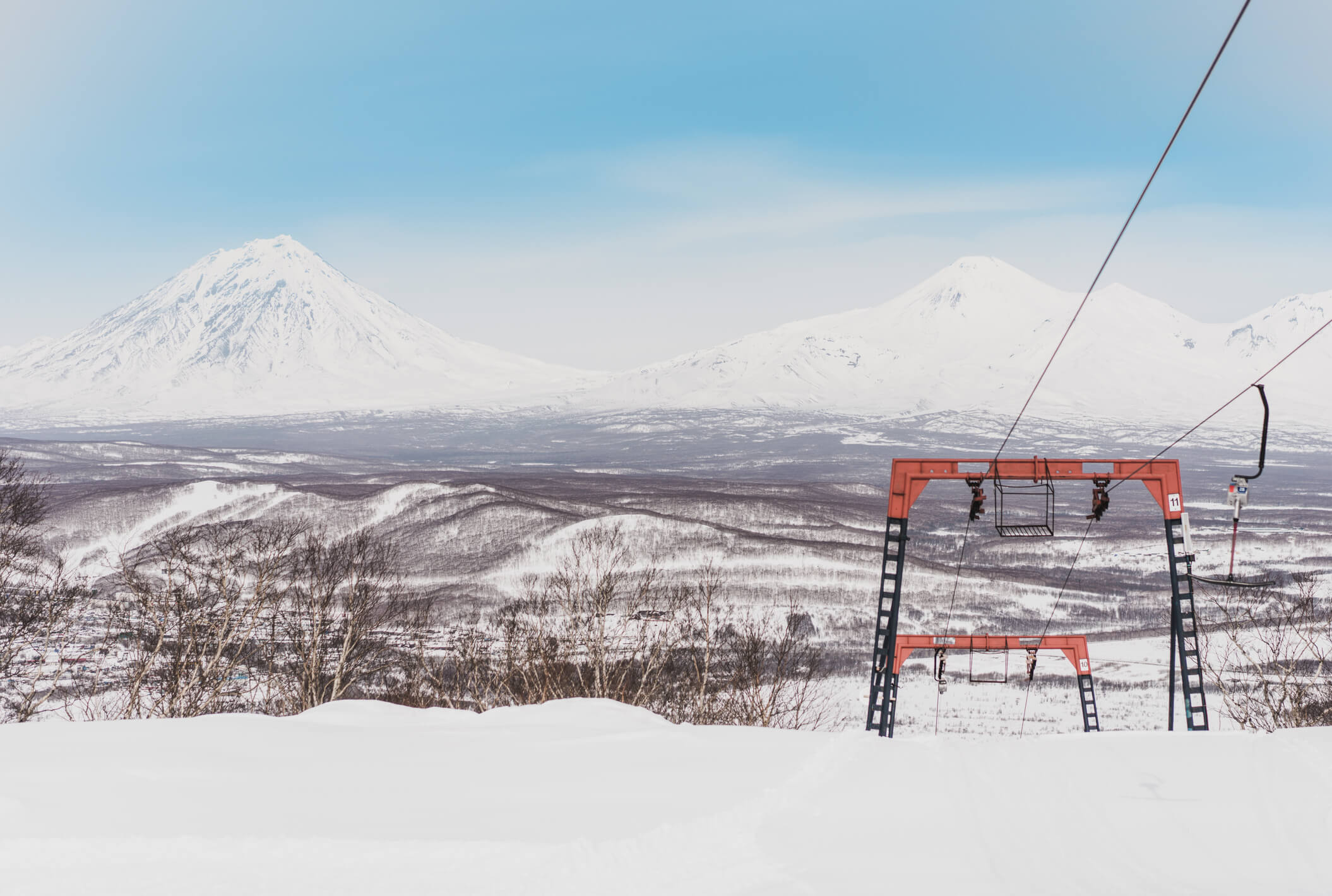 Winter mountain landscape with ski trail. Kamchatka peninsula