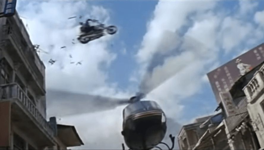 Motorcycle and helicopter movie scene from Tomorrow Never Dies